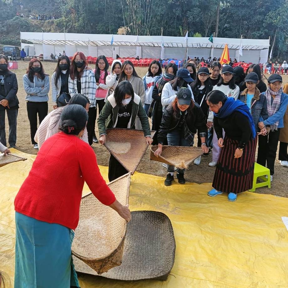 Young girls learning the process of cleaning harvested rice from village elders at the four-day Khensa Students’ Union (KSU) 9th Walu Aten (triennial students’ conference) at Walu Aten Ground, Khensa village in Mokokchung. Around 500 students from different parts of Nagaland participated in this year’s Walu Aten held under the theme ‘to renew and strengthen each other’ from December 26 to 29, 2022.
